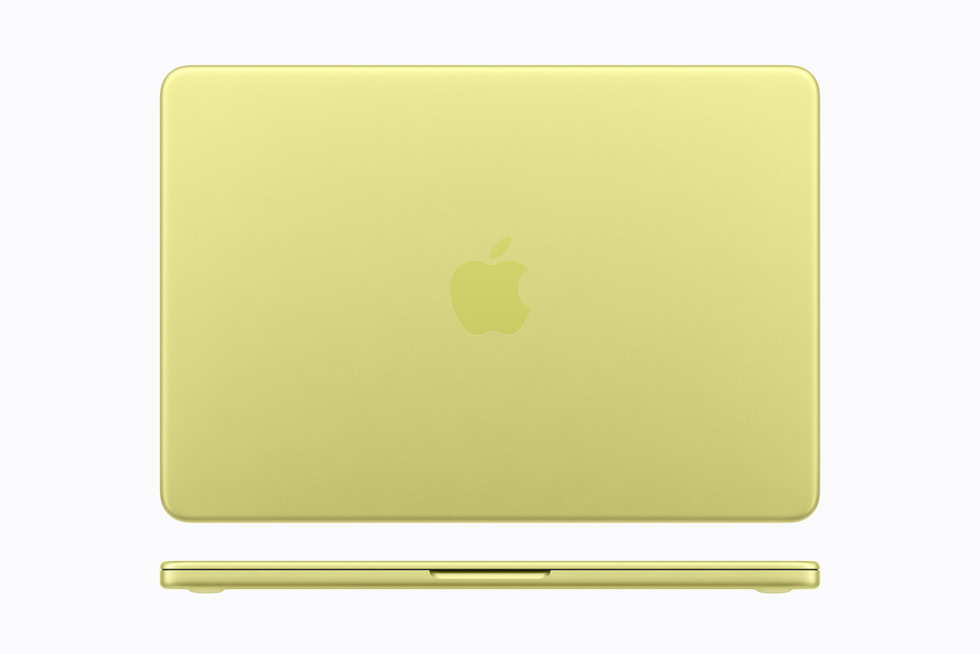 MacBook Neo in citrus color on a desk